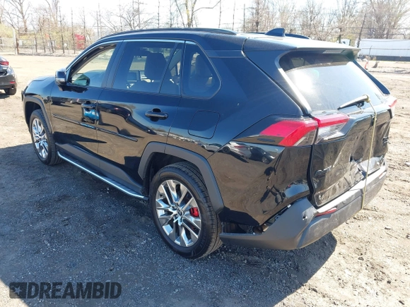 2021 Toyota RAV4 XLE Premium with VIN 2T3A1RFV6MC236809, listed as a IAAI auction lot 42056379 with 99,921 mi miles and . Bid and sale history available at DreamBid. Image 3.