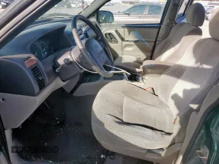 1999 Jeep Grand Cherokee Laredo with VIN 1J4G258S0XC561054, listed as a Copart auction lot 49814555 with Not provided miles and Salvage title. Bid and sale history available at DreamBid. Image 7.