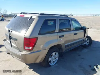 2005 Jeep Grand Cherokee Laredo with VIN 1J4GR48K85C540116, listed as a IAAI auction lot 41816065 with 137,388 mi miles. Bid and sale history available at carsss.com. Image 4.