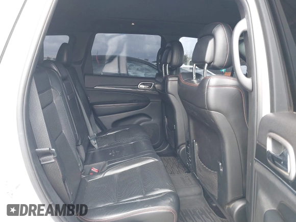 2018 Jeep Grand Cherokee Trailhawk with VIN 1C4RJFLT2JC137793, listed as a IAAI auction lot 41697299 with 149,100 mi miles and . Bid and sale history available at DreamBid. Image 8.