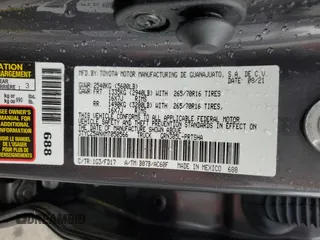 2021 Toyota Tacoma SR z VIN 3TYCZ5ANXMT050566, wystawiony jako Copart lot #57315615 z przebiegiem Nie podano mil oraz Szkoda całkowita • Salvage title. Historia ofert i sprzedaży dostępna na DreamBid. Obrazek 13.