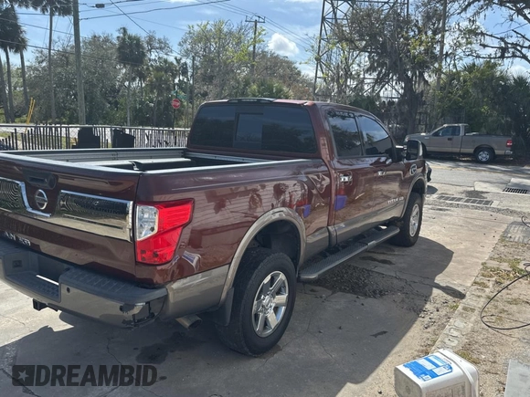 2016 Nissan Titan SL z VIN 1N6BA1F20GN510413, wystawiony jako Copart lot #48017425 z przebiegiem 225 717 mil mil oraz Czysty tytuł • Clean title. Historia ofert i sprzedaży dostępna na DreamBid. Obrazek 4.