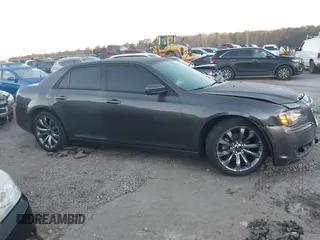 2014 Chrysler 300 S with VIN 2C3CCABG2EH352220, listed as a IAAI auction lot 41796284 with 127,070 mi miles and . Bid and sale history available at DreamBid. Image 13.
