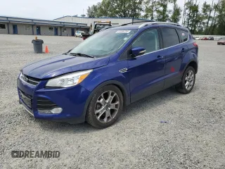 2016 Ford Escape Titanium with VIN 1FMCU9JX2GUC01916, listed as a Copart auction lot 61086755 with 94,625 mi miles and Salvage title. Bid and sale history available at DreamBid. Image 1.