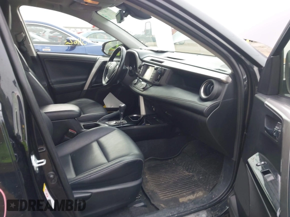 2017 Toyota RAV4 Hybrid Limited with VIN JTMDJREV7HD136797, listed as a IAAI auction lot 41733609 with 131,162 mi miles. Bid and sale history available at carsss.com. Image 5.