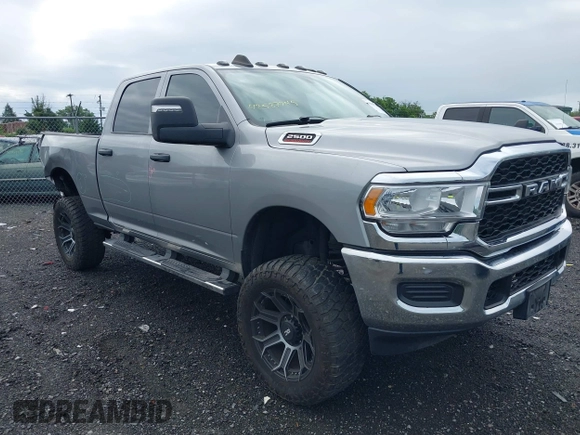 2023 Ram 2500 Tradesman with VIN 3C6UR5CJXPG590942, listed as a IAAI auction lot 42587742 with 76,595 mi miles and . Bid and sale history available at DreamBid. Image 1.