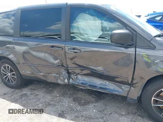 2015 Dodge Grand Caravan American Value with VIN 2C4RDGBGXFR682995, listed as a IAAI auction lot 41994708 with 142,725 mi miles and . Bid and sale history available at DreamBid. Image 6.
