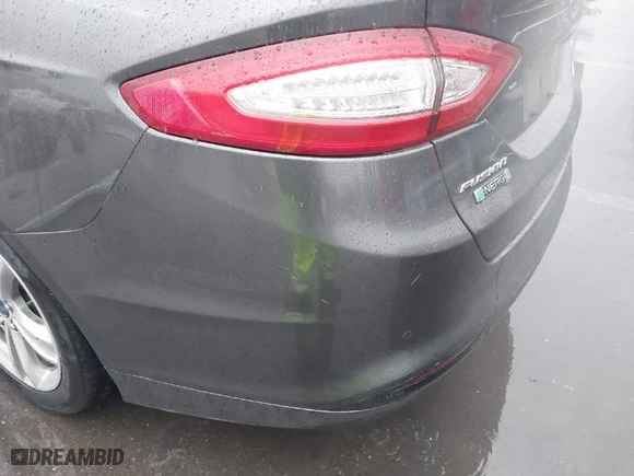 2015 Ford Fusion Energi Titanium with VIN 3FA6P0SU2FR173958, listed as a IAAI auction lot 41504220 with 170,235 mi miles. Bid and sale history available at carsss.com. Image 6.