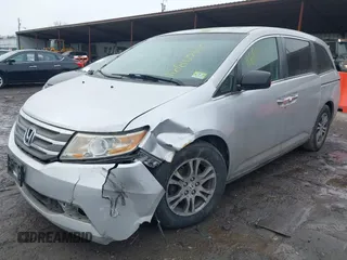 2013 Honda Odyssey EX-L with VIN 5FNRL5H63DB007682, listed as a IAAI auction lot 41408103 with 201,453 mi miles and . Bid and sale history available at carsss.com. Image 17.