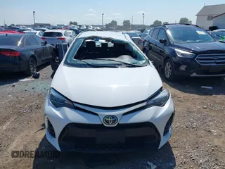 2017 Toyota Corolla L with VIN 5YFBURHE8HP689577, listed as a IAAI auction lot 42601267 with 142,853 mi miles and . Bid and sale history available at DreamBid. Image 12.