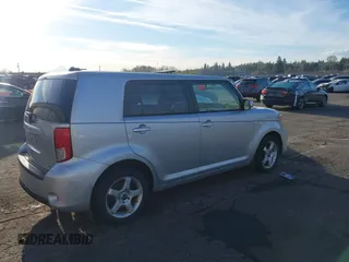 2015 Scion xB with VIN JTLZE4FE7FJ073828, listed as a IAAI auction lot 41857967 with 56,242 mi miles. Bid and sale history available at carsss.com. Image 4.