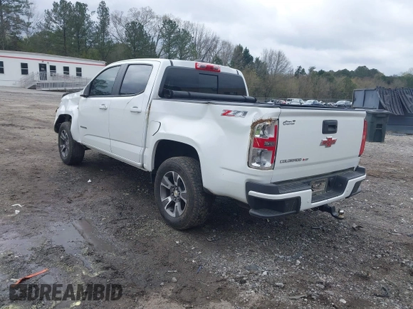 2020 Chevrolet Colorado 4WD Z71 with VIN 1GCGTDEN6L1228309, listed as a IAAI auction lot 41865357 with 100,560 mi miles and . Bid and sale history available at DreamBid. Image 3.