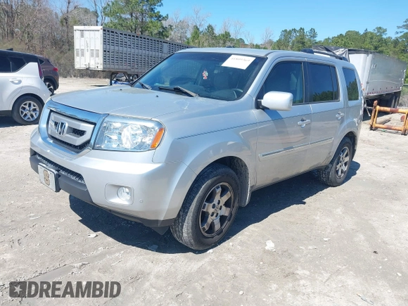 2011 Honda Pilot Touring with VIN 5FNYF4H91BB086712, listed as a IAAI auction lot 41809369 with 260,718 mi miles. Bid and sale history available at carsss.com. Image 17.
