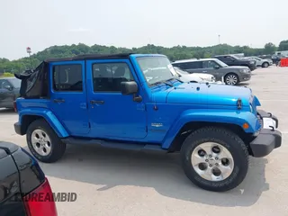 2015 Jeep Wrangler Unlimited Altitude с VIN 1C4HJWEG3FL528051, выставлен на аукционе IAAI как лот 42388844 с пробегом 87 596 миль миль и . История ставок и продаж доступна на DreamBid. Изображение 13.