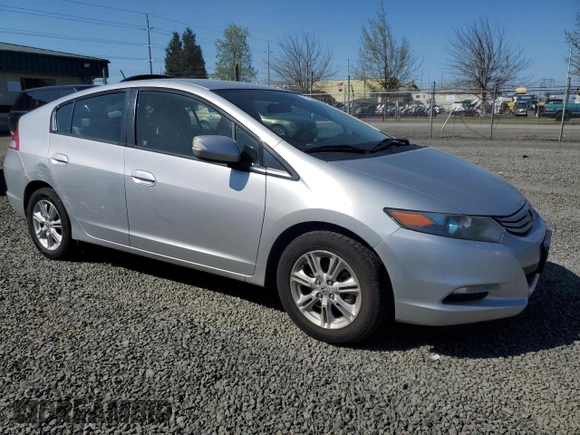 2010 Honda Insight EX z VIN JHMZE2H74AS034758, wystawiony jako Copart lot #52905445 z przebiegiem 154 148 mil mil oraz Szkoda całkowita • Salvage title. Historia ofert i sprzedaży dostępna na DreamBid. Obrazek 4.