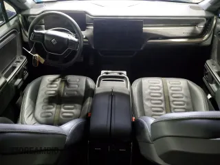 2023 Rivian R1T Adventure with VIN 7FCTGAAA0PN024165, listed as a Copart auction lot 84265444 with Not Provided miles and Salvage Title. Bid and sale history available at carsss.com. Image 8.