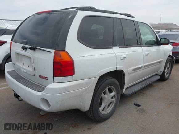 2003 GMC Envoy SLE with VIN 1GKDS13S532253648, listed as a IAAI auction lot 41850094 with 147,254 mi miles. Bid and sale history available at carsss.com. Image 4.