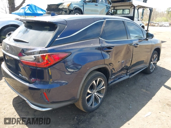 2019 Lexus RX 450hL Premium with VIN JTJDGKCA4K2006465, listed as a IAAI auction lot 42079022 with 77,241 mi miles and . Bid and sale history available at DreamBid. Image 6.