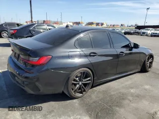 2021 BMW 3 Series M340i with VIN 3MW5U7J08M8C10288, listed as a Copart auction lot 47652205 with 39,866 mi miles and Salvage Title. Bid and sale history available at carsss.com. Image 3.
