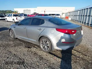 2015 Kia Optima SX z VIN 5XXGR4A72FG419739, wystawiony jako IAAI lot #41972453 z przebiegiem 204 336 mil mil oraz . Historia ofert i sprzedaży dostępna na DreamBid. Obrazek 3.
