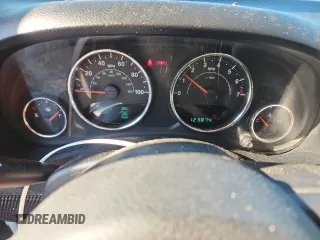 2012 Jeep Wrangler Sport with VIN 1C4AJWAG5CL273292, listed as a Copart auction lot 60135395 with 123,874 mi miles and Salvage title. Bid and sale history available at DreamBid. Image 9.