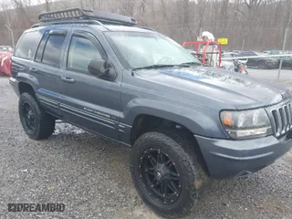 2003 Jeep Grand Cherokee Limited with VIN 1J4GW58N43C521617, listed as a IAAI auction lot 41781064 with 228,086 mi miles. Bid and sale history available at carsss.com. Image 1.
