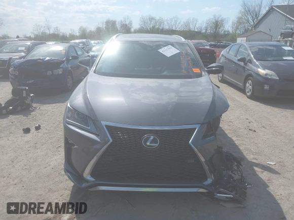 2016 Lexus RX 350 with VIN 2T2BZMCA3GC004744, listed as a IAAI auction lot 42117962 with 119,635 mi miles and . Bid and sale history available at DreamBid. Image 12.