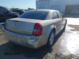 2009 Chrysler 300 Limited with VIN 2C3KA33V99H592963, listed as a IAAI auction lot 42041417 with 160,829 mi miles. Bid and sale history available at carsss.com. Image 4.