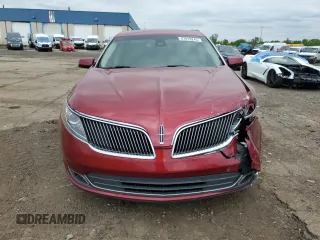 2013 Lincoln MKS EcoBoost with VIN 1LNHL9FT1DG604990, listed as a Copart auction lot 57619245 with 76,899 mi miles and Clean title. Bid and sale history available at DreamBid. Image 5.