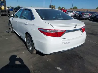2015 Toyota Camry XLE with VIN 4T1BF1FK5FU107211, listed as a IAAI auction lot 42000437 with 78,158 mi miles and . Bid and sale history available at DreamBid. Image 3.