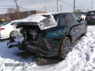 2024 Cadillac LYRIQ z VIN 1GYKPVRL8RZ128147, wystawiony jako IAAI lot #41273392 z przebiegiem 1 927 mil mil oraz . Historia ofert i sprzedaży dostępna na DreamBid. Obrazek 4.
