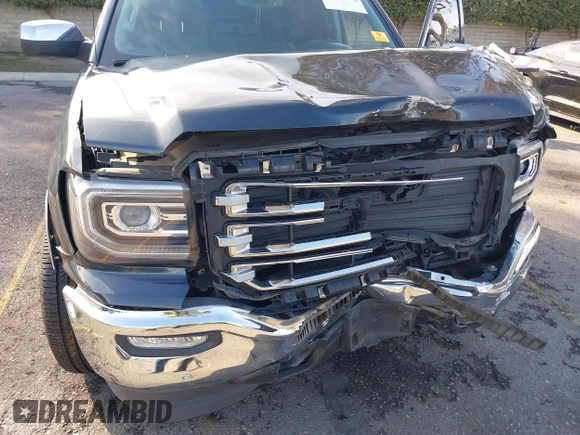 2018 GMC Sierra 1500 with VIN 3GTU1NEC7JG257796, listed as a IAAI auction lot 41570419 with 92,186 mi miles and . Bid and sale history available at DreamBid. Image 6.