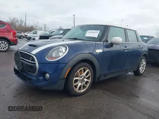2015 MINI Hardtop 4 Door S with VIN WMWXU3C58FT892238, listed as a IAAI auction lot 41104432 with 156,722 mi miles and . Bid and sale history available at DreamBid. Image 2.