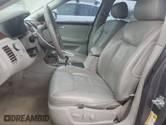 2007 Cadillac DTS Luxury I with VIN 1G6KD57Y17U113855, listed as a Copart auction lot 51031305 with 158,922 mi miles and Salvage Title. Bid and sale history available at DreamBid. Image 7.
