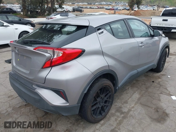 2018 Toyota C-HR XLE with VIN NMTKHMBX4JR023586, listed as a IAAI auction lot 41890863 with 86,958 mi miles and . Bid and sale history available at DreamBid. Image 4.