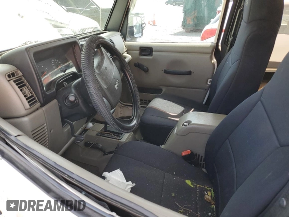 2005 Jeep Wrangler X with VIN 1J4FA39S75P332586, listed as a Copart auction lot 53334725 with 96,728 mi miles and Salvage title. Bid and sale history available at DreamBid. Image 7.