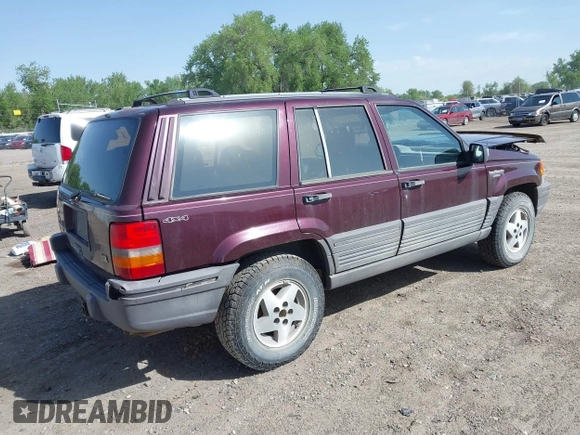 1994 Jeep Grand Cherokee Laredo with VIN 1J4GZ58Y2RC112641, listed as a IAAI auction lot 42212705 with 160,762 mi miles and . Bid and sale history available at DreamBid. Image 4.