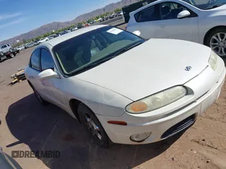 2001 Oldsmobile Aurora z VIN 1G3GR64H414288395, wystawiony jako IAAI lot #42260825 z przebiegiem 246 744 mil mil oraz . Historia ofert i sprzedaży dostępna na DreamBid. Obrazek 1.