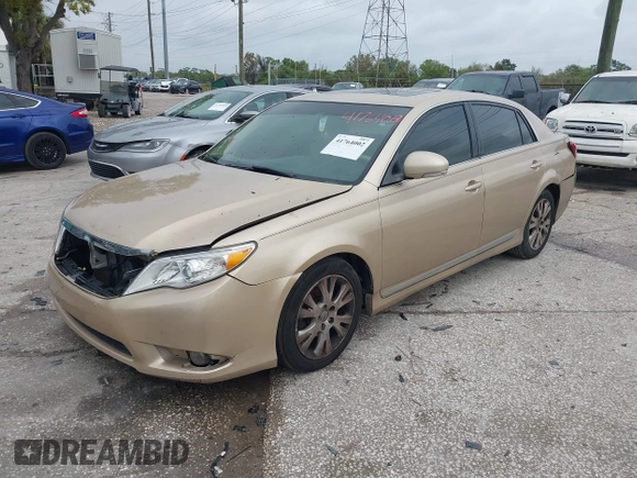 2011 Toyota Avalon with VIN 4T1BK3DB2BU432502, listed as a IAAI auction lot 41764002 with 236,003 mi miles and . Bid and sale history available at DreamBid. Image 2.