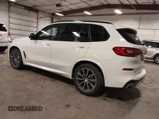 2020 BMW X5 xDrive40i with VIN 5UXCR6C01LLL66648, listed as a IAAI auction lot 42372631 with 59,770 mi miles and . Bid and sale history available at DreamBid. Image 3.