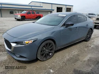 2022 Mazda 3 Carbon Edition z VIN 3MZBPACL1NM309042, wystawiony jako Copart lot #51786535 z przebiegiem 40 053 mil mil oraz Szkoda całkowita • Salvage title. Historia ofert i sprzedaży dostępna na DreamBid. Obrazek 1.
