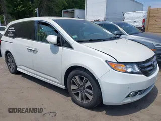 2015 Honda Odyssey Touring Elite with VIN 5FNRL5H92FB071936, listed as a IAAI auction lot 42413988 with 183,442 mi miles and . Bid and sale history available at DreamBid. Image 1.