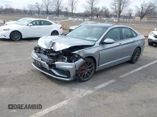 2021 Volkswagen Jetta S z VIN 3VW6T7BU3MM020687, wystawiony jako IAAI lot #41621894 z przebiegiem 25 837 mil mil oraz . Historia ofert i sprzedaży dostępna na DreamBid. Obrazek 17.