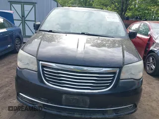 2012 Chrysler Town & Country Touring with VIN 2C4RC1BG7CR301101, listed as a IAAI auction lot 42173814 with 141,128 mi miles. Bid and sale history available at carsss.com. Image 6.