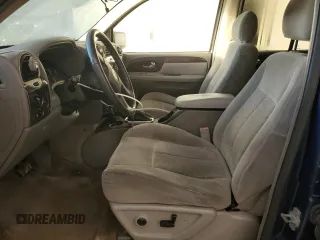 2005 GMC Envoy SLT with VIN 1GKDS13S652339845, listed as a Copart auction lot 77693684 with 220,306 mi miles and Salvage Title. Bid and sale history available at carsss.com. Image 7.