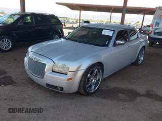 2010 Chrysler 300 Touring with VIN 2C3CA4CD6AH224777, listed as a IAAI auction lot 41911427 with 115,756 mi miles and . Bid and sale history available at DreamBid. Image 2.