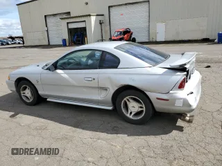 1998 Ford Mustang with VIN 1FAFP4041WF104623, listed as a Copart auction lot 50089825 with 189,313 mi miles and Salvage title. Bid and sale history available at DreamBid. Image 2.