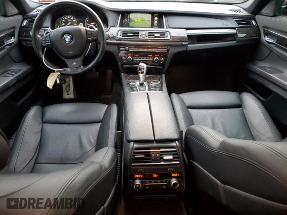 2014 BMW 7 Series 740Li xDrive with VIN WBAYF4C59ED281776, listed as a Copart auction lot 83563234 with 77,899 mi miles and Salvage Title. Bid and sale history available at carsss.com. Image 8.