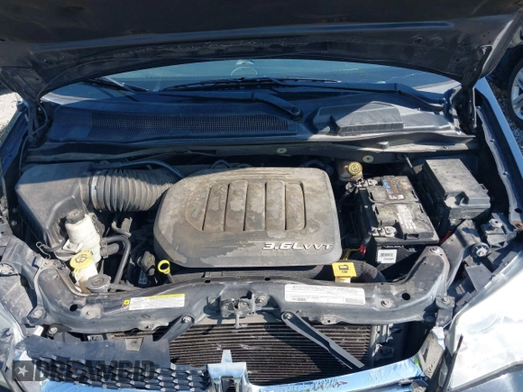 2012 Dodge Grand Caravan SXT with VIN 2C4RDGCG2CR319651, listed as a IAAI auction lot 42097594 with 155,521 mi miles and . Bid and sale history available at DreamBid. Image 10.