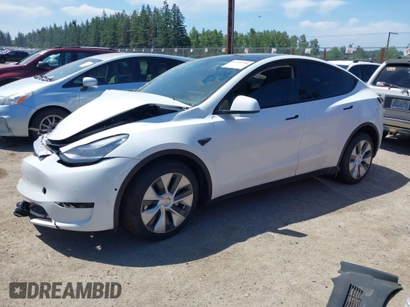 2022 Tesla Model Y Long Range z VIN 7SAYGDEE9NF509655, wystawiony jako IAAI lot #42433796 z przebiegiem 46 936 mil mil oraz . Historia ofert i sprzedaży dostępna na DreamBid. Obrazek 23.